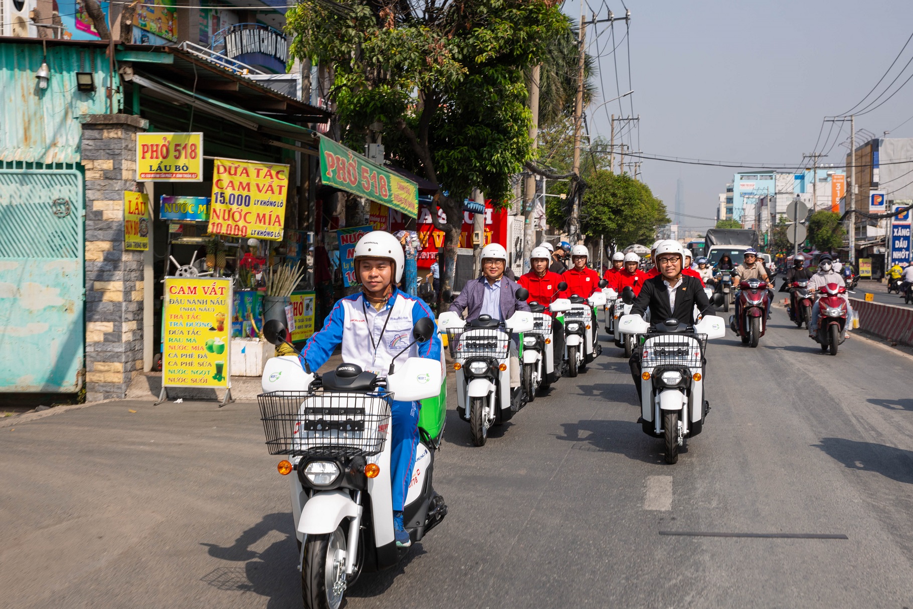 HVN và Lotteria Việt Nam hợp tác triển khai dự án sử dụng xe điện giao hàng.jpg.jpg